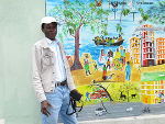 Emanuel K. Nkrumah (ENKS) vor seinem Bild für die Grazer Pfarre St. Andrä